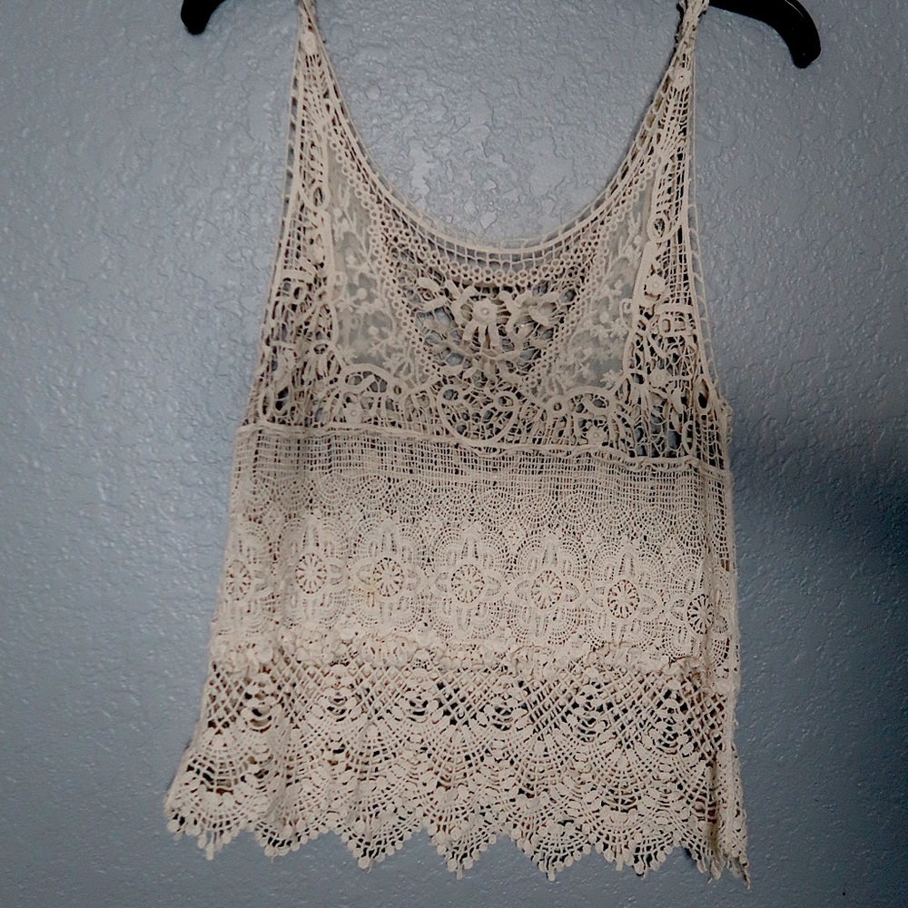 Lace appliqué blouse.
